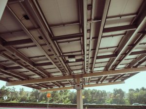 View of a metal roofing structure with reinforcement, outdoors during the day.